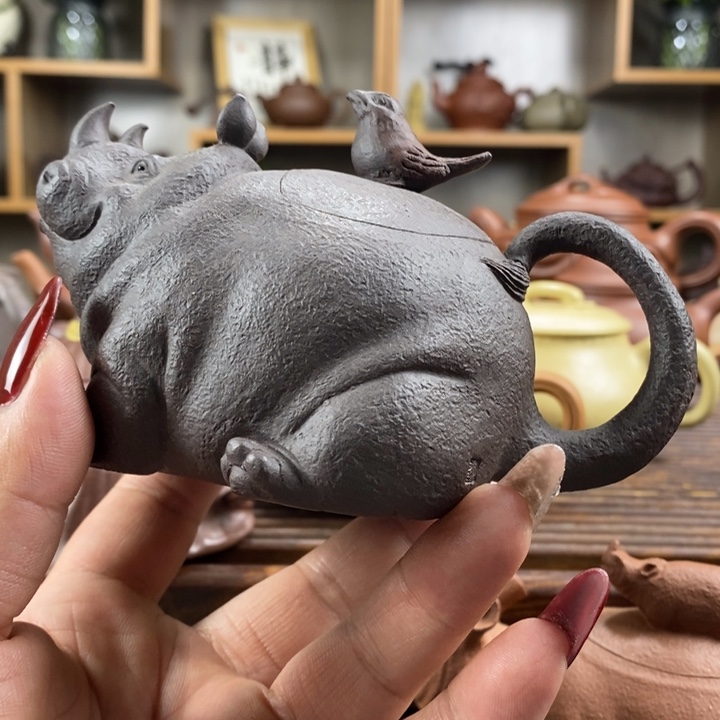 紫砂茶壶修**平原矿紫去