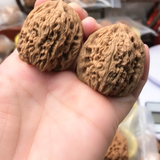 文玩核桃把件词***卿南疆石