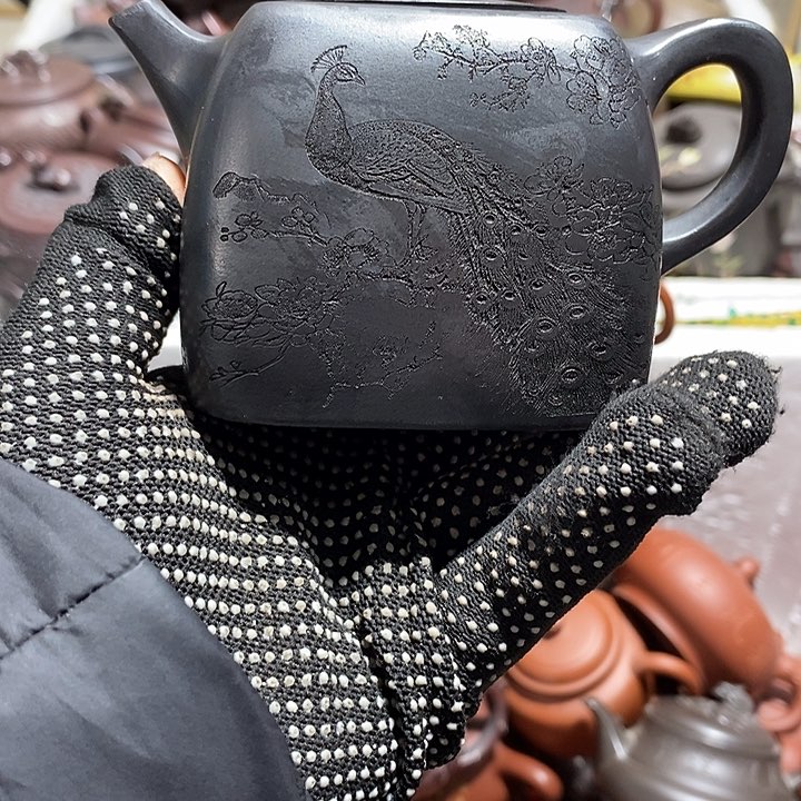 紫砂茶壶晃盖流口水