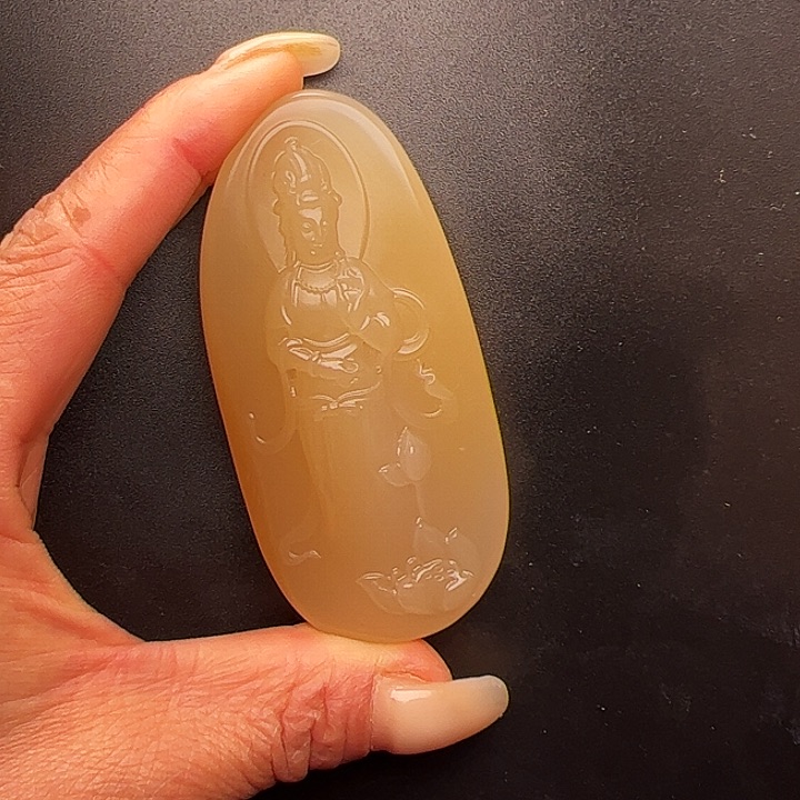 石英质玉黄蜡石观音挂件未镶嵌星***风