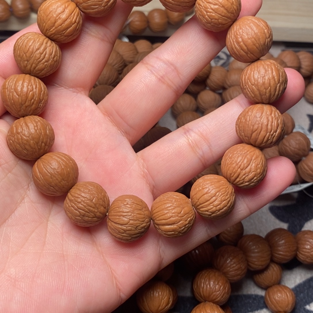 手串桃核凤羽精打底15➕