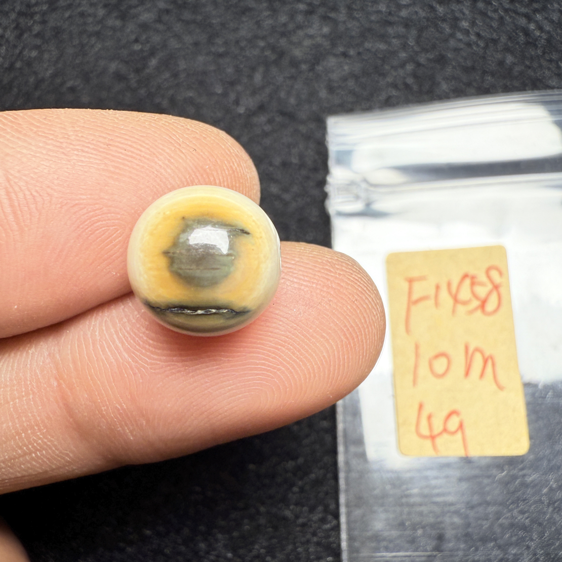 F1458猛犸象牙冰料蓝眼睛圆珠10mm