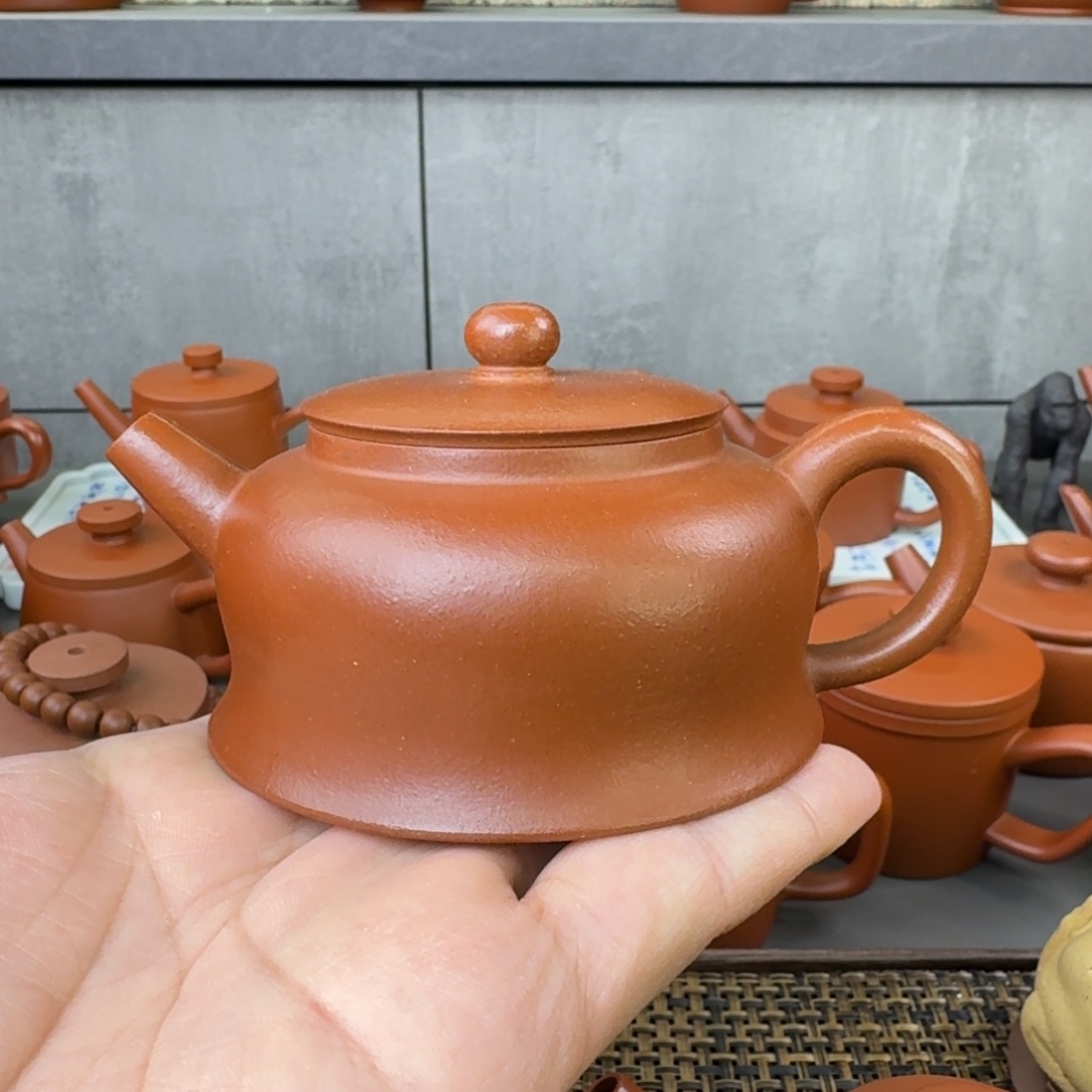 紫砂茶壶红降坡曲钟