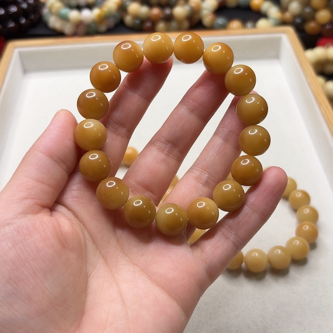 橙***子菩提根/象牙果手串