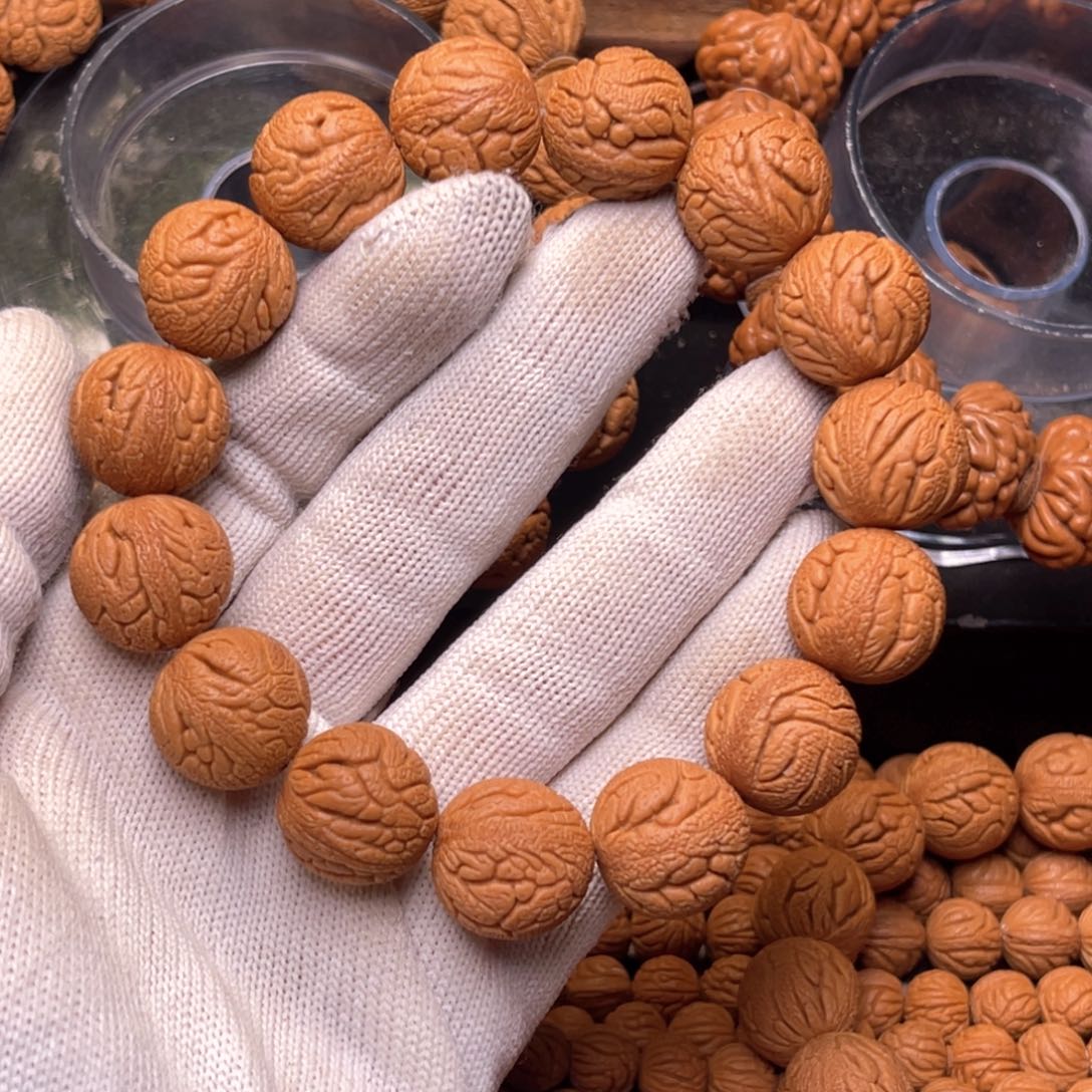 手串桃核金丝龙珠1.7