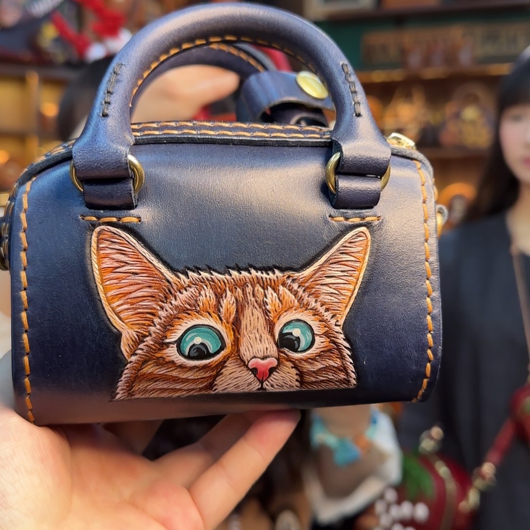 用***7牦牛剖层皮革迷你波士顿蓝色