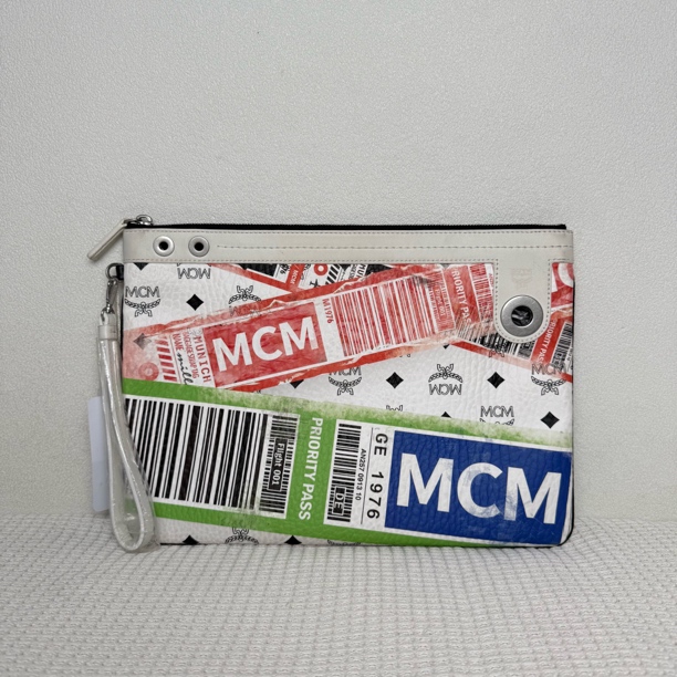 99新 MCM 98新/6608男士时尚涂鸦印花手拿包