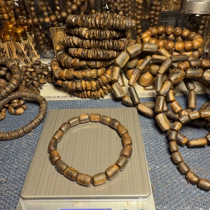 树脂制品火**燚金沙叶树心油桶珠9.7克