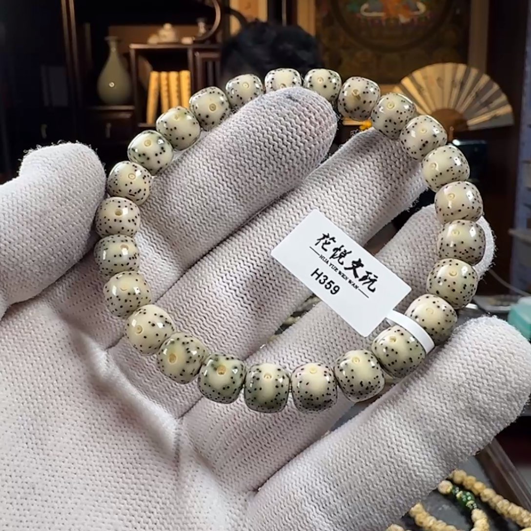 胡***杨手串星月菩提9x8 石玉料青花瓷双留白 H359