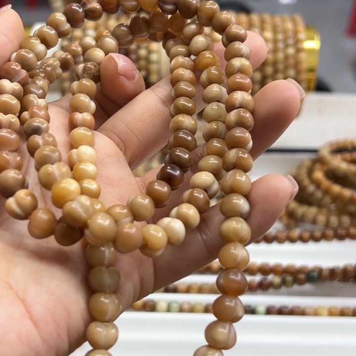 右***华龙脊菩提手串卡9屁桃