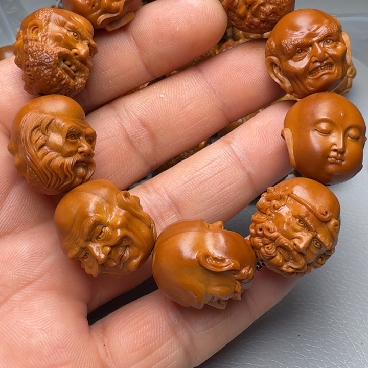 橄榄核手串笑**开橄榄核666