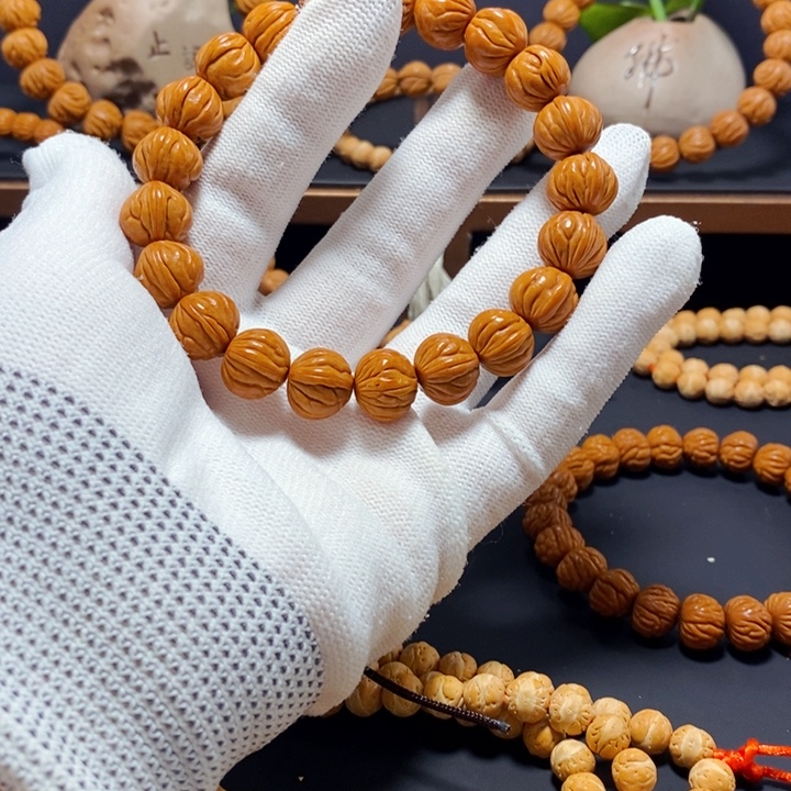 手串桃核柿子红手串