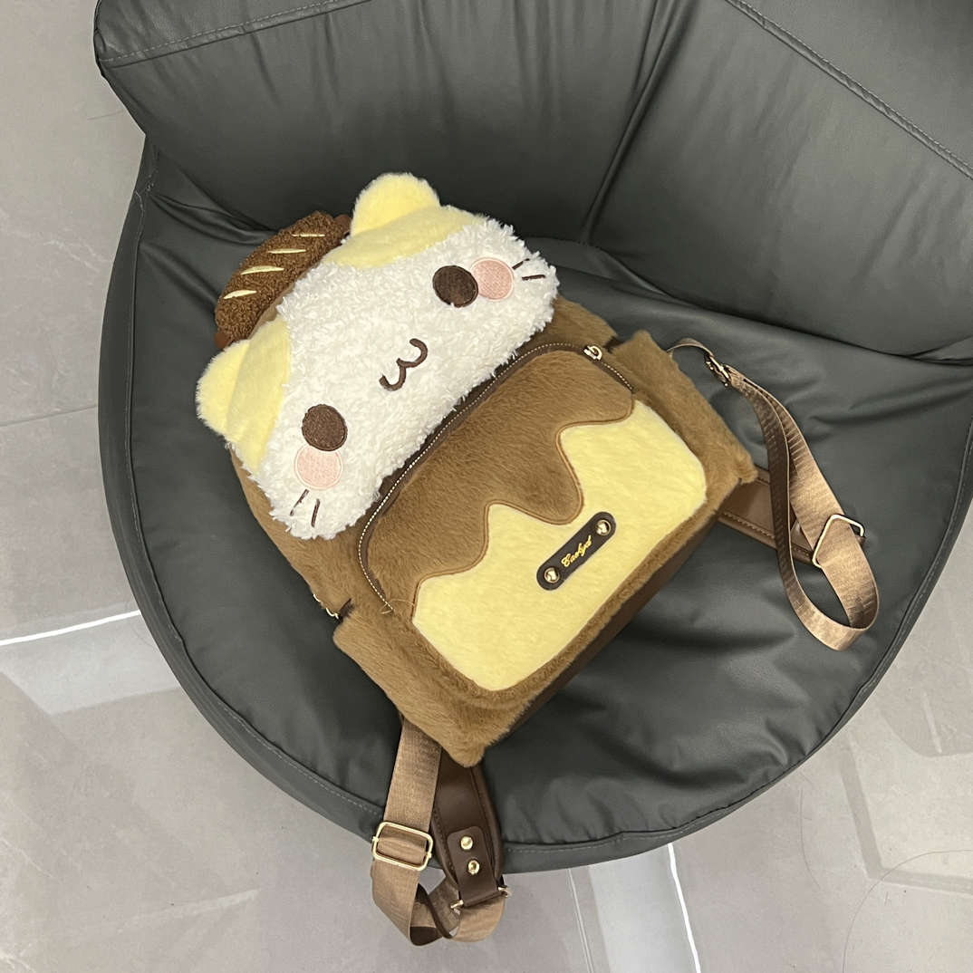 软乎乎可爱焦糖布丁面包猫大容量秋冬双肩包