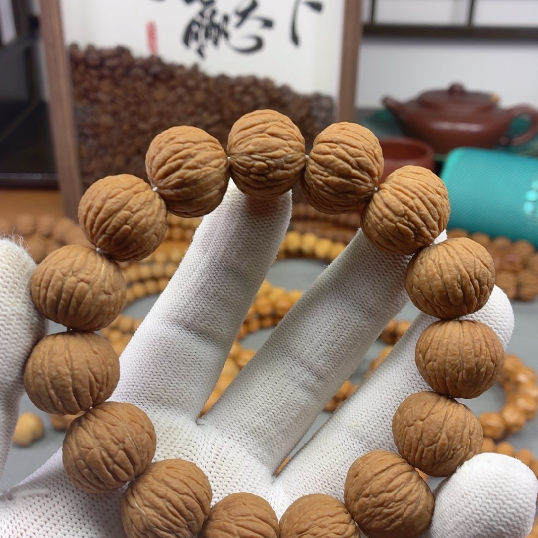 猴头核桃手串麒麟纹磨盘凤羽