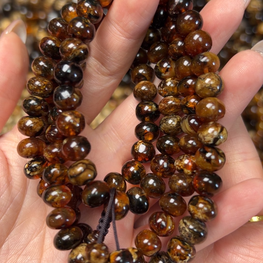 琥珀手链未镶嵌雷*抚顺琥珀黑花