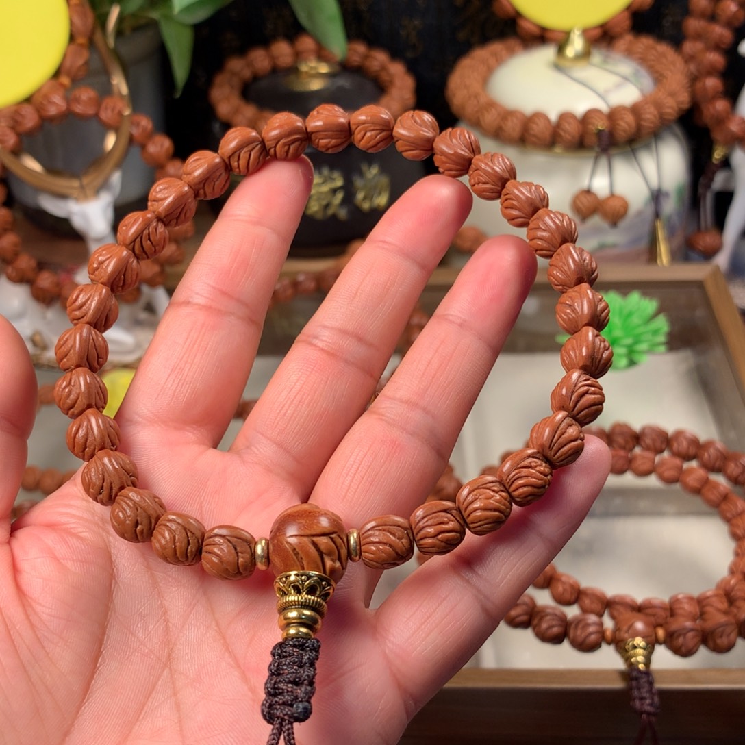 淡***泊桃核吊坠双脊龙手持10