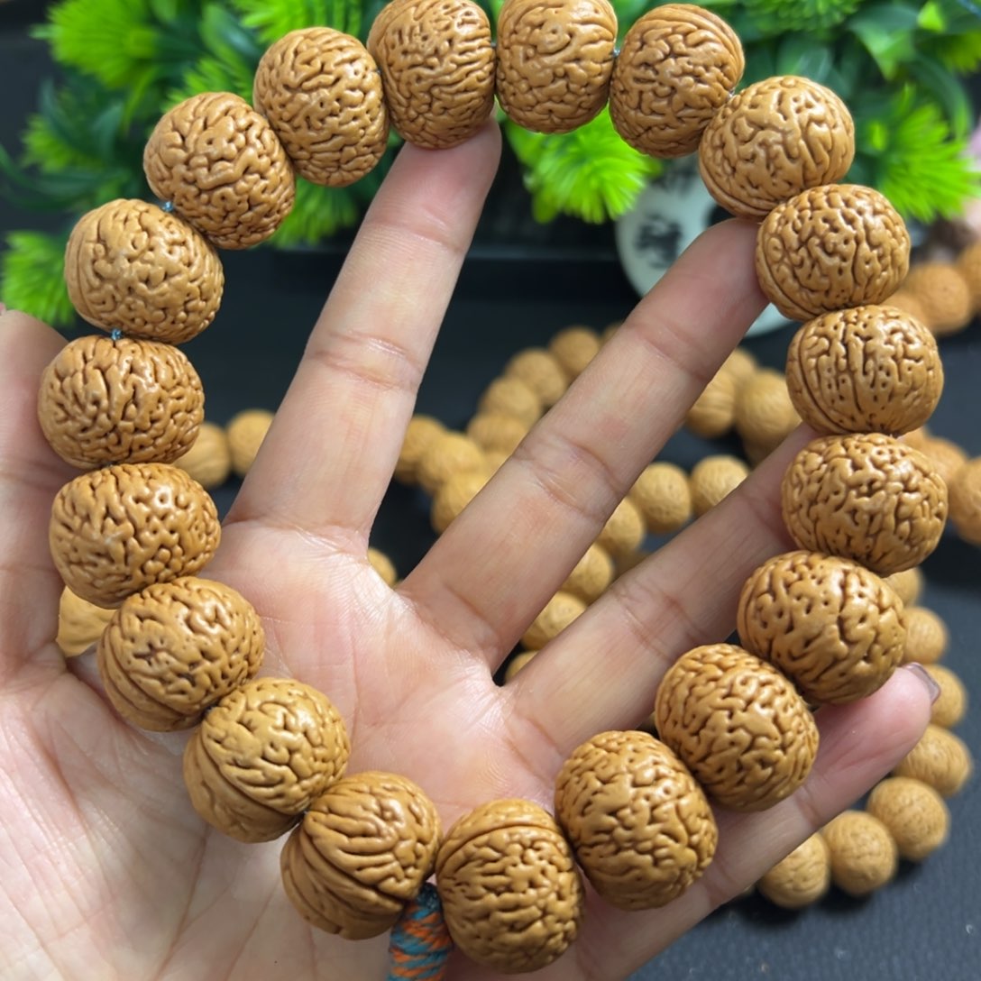 左***边桃木磨盘桃核手串