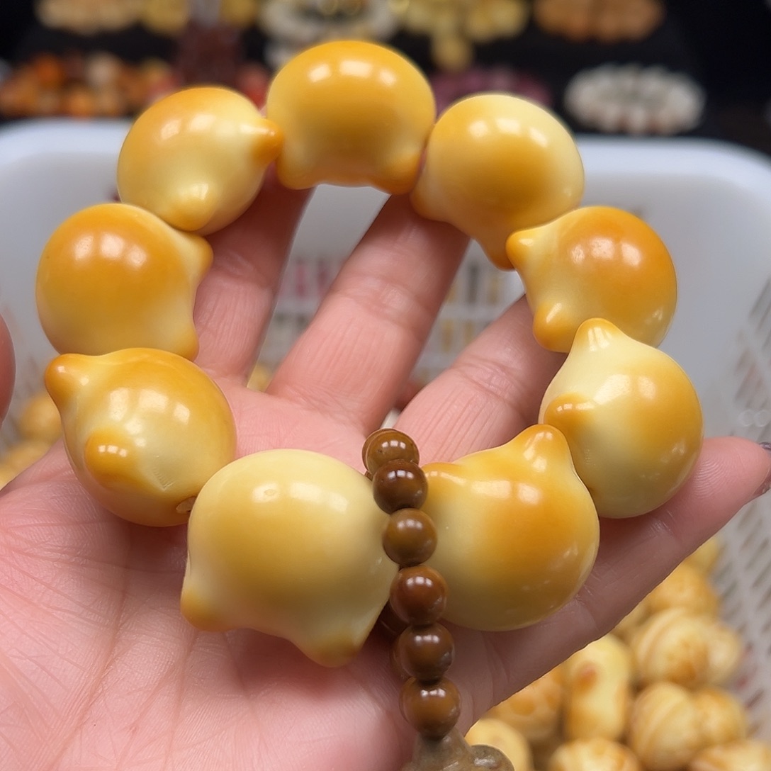 菩提根/象牙果手串微瑕卡29左右炭烧牙果猫头一条