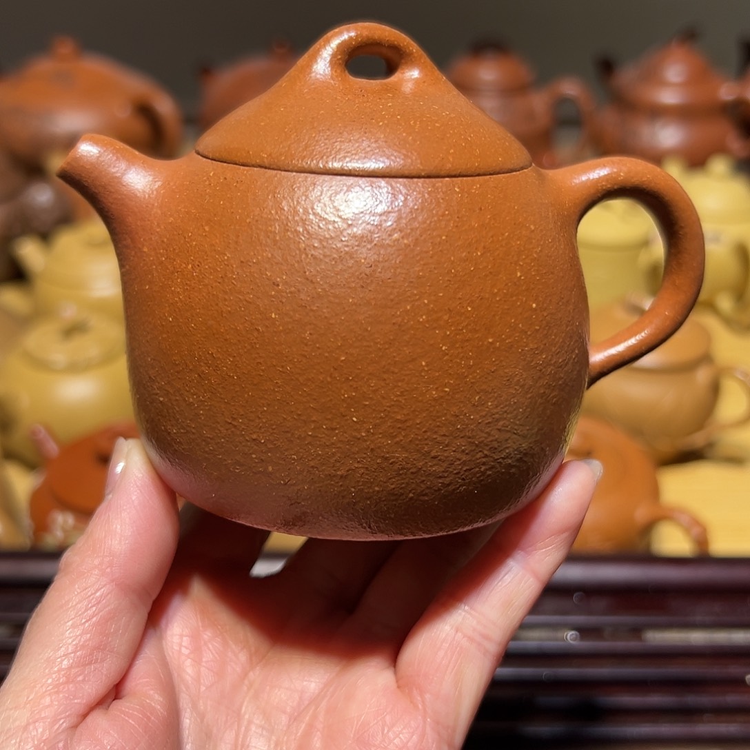 茶壶紫砂盖松一点