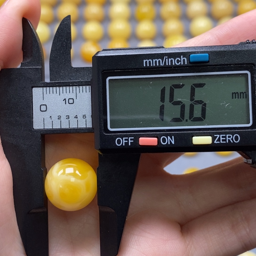 橘***子琥珀未镶嵌裸石纯天然