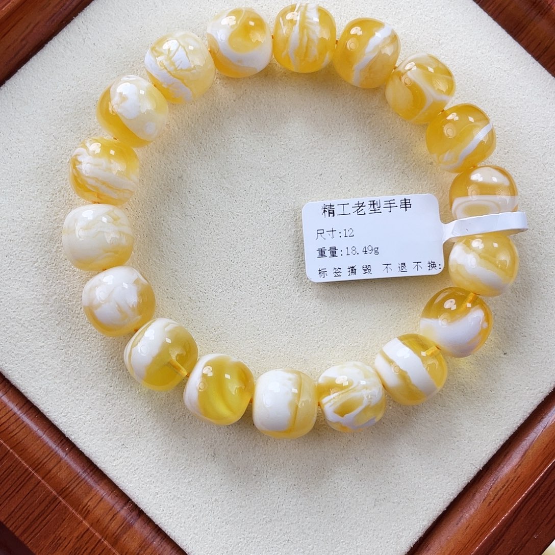 琥珀未镶嵌裸石12mm金瓷白溶洞妖花