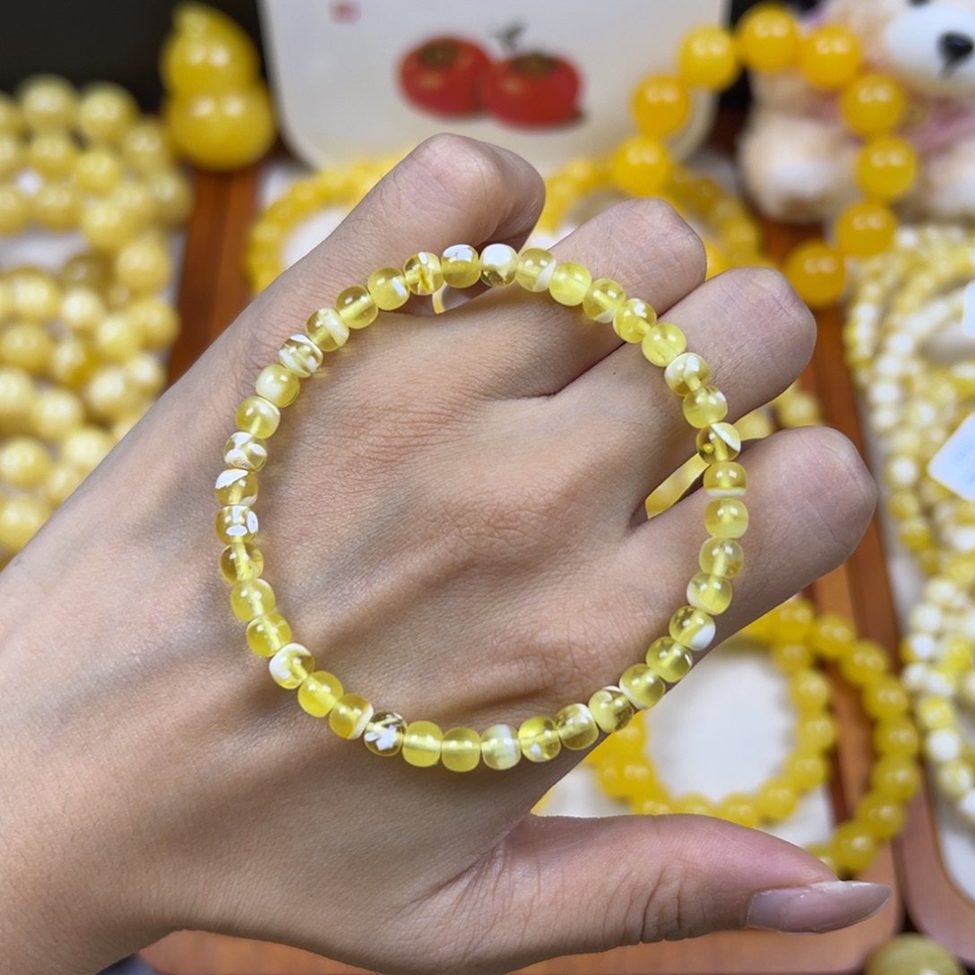 发****琥珀未镶嵌手链5mm 金瓷白