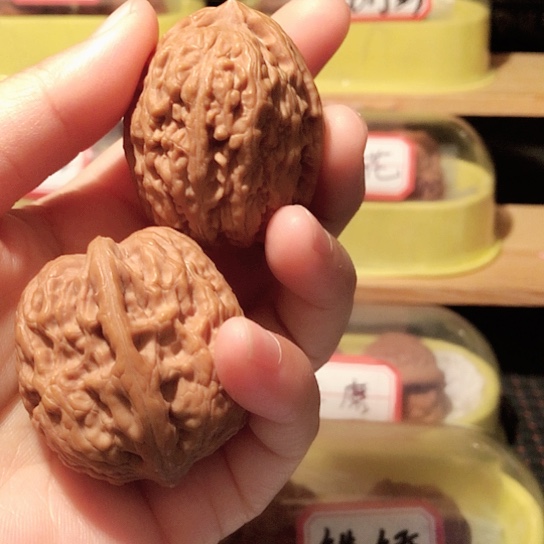 弹***牛文玩核桃把件滚石