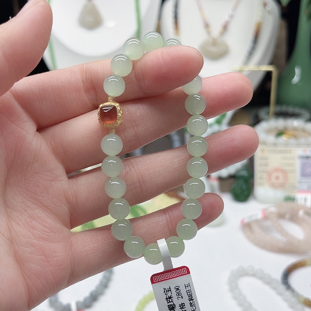 笑***姐和田玉18K金镶嵌手链