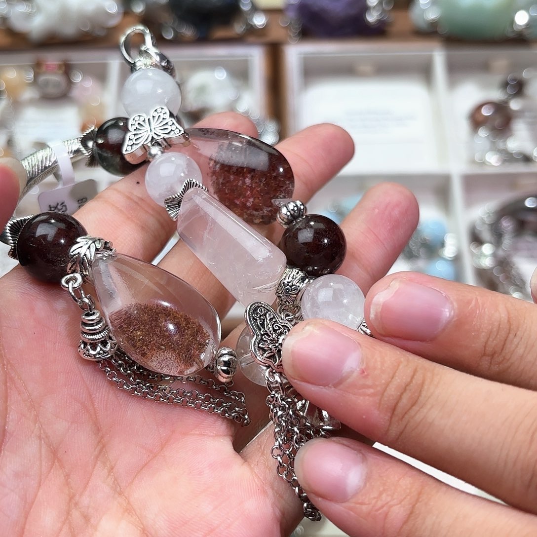 忧***橘水晶手串合金水晶