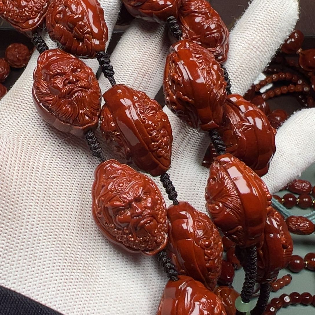 乡***情橄榄核吊坠8645788899