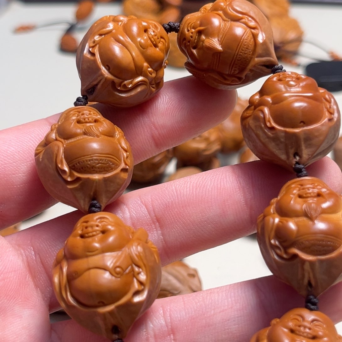 橄榄核吊坠墨*轩包衣财迷