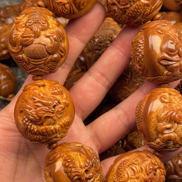 橄榄核吊坠皇****哥橄榄核手持