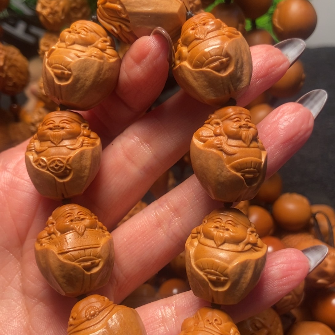 橄榄核吊坠包衣财神