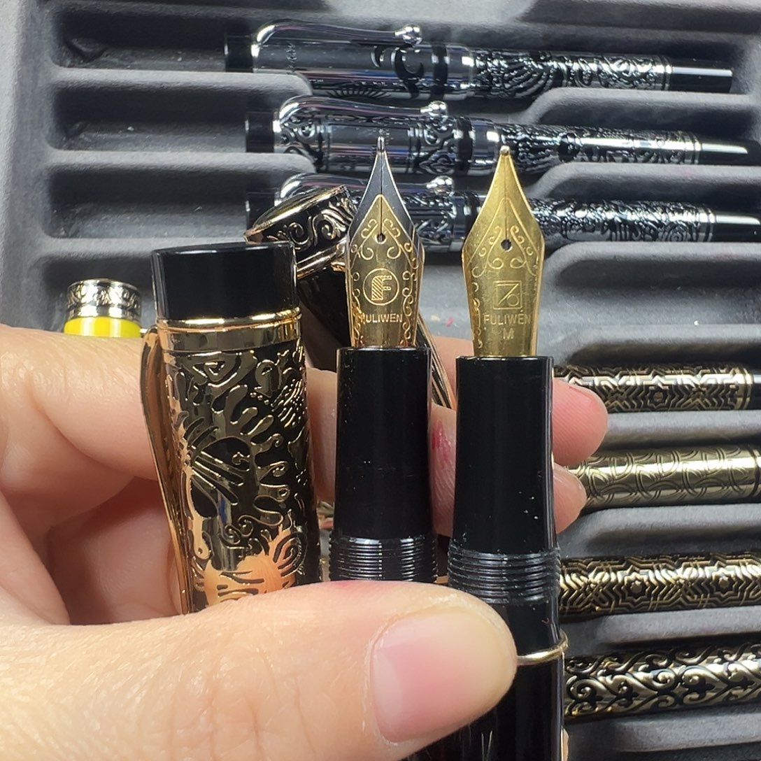 聼***軒便携式黑色2085m尖加小金人长刀笔尖