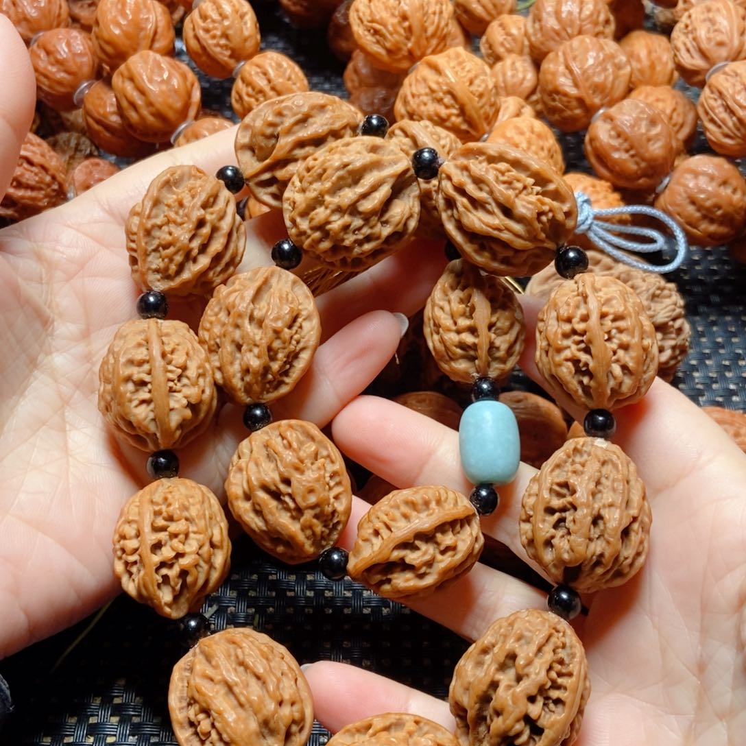 文玩核桃手串钱袋