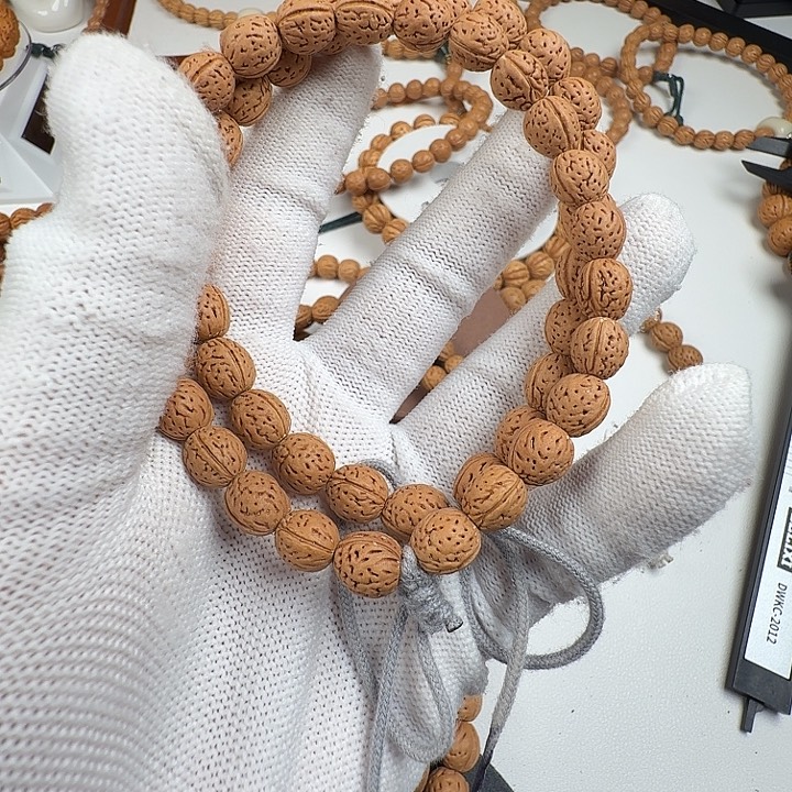 斌***你桃核吊坠8888888不退不换