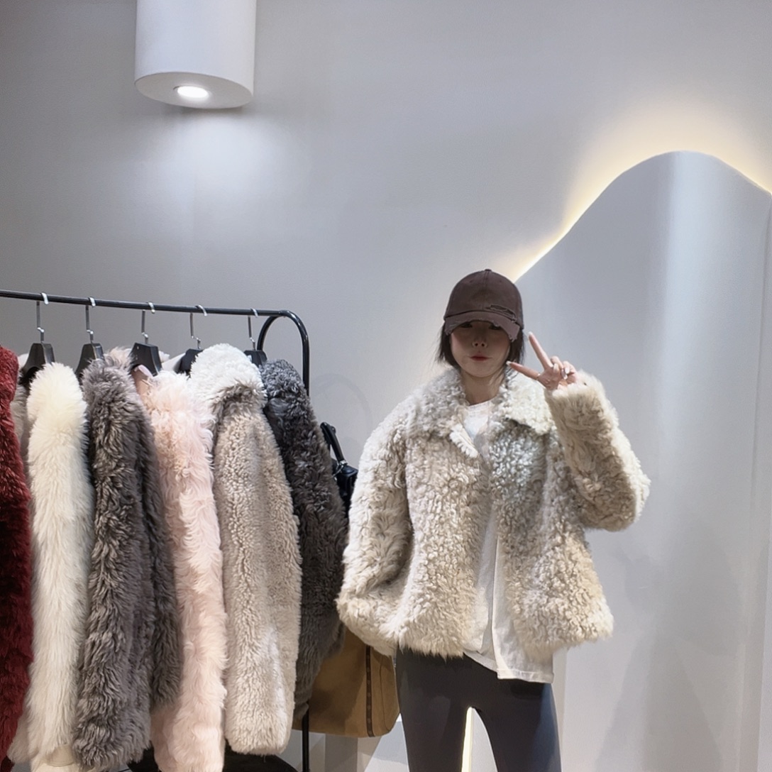 飘***花真皮皮毛一体外套222-3367。125斤内