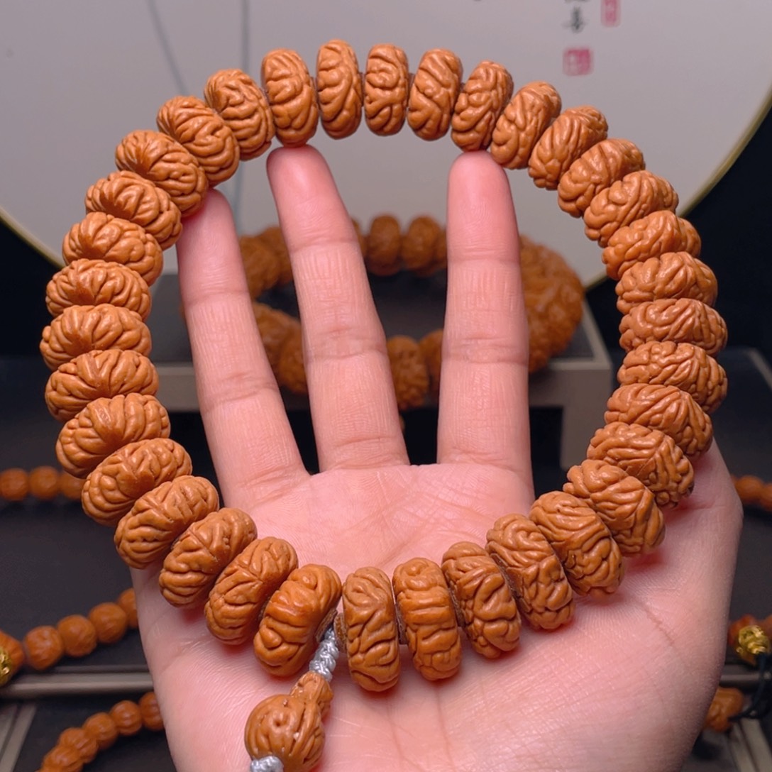 丛****吊坠桃核19尺寸祥云纽扣