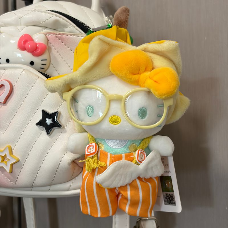 正版Kitty香蕉扮装可爱毛绒玩偶挂件包包挂饰kt猫钥匙扣生日礼物