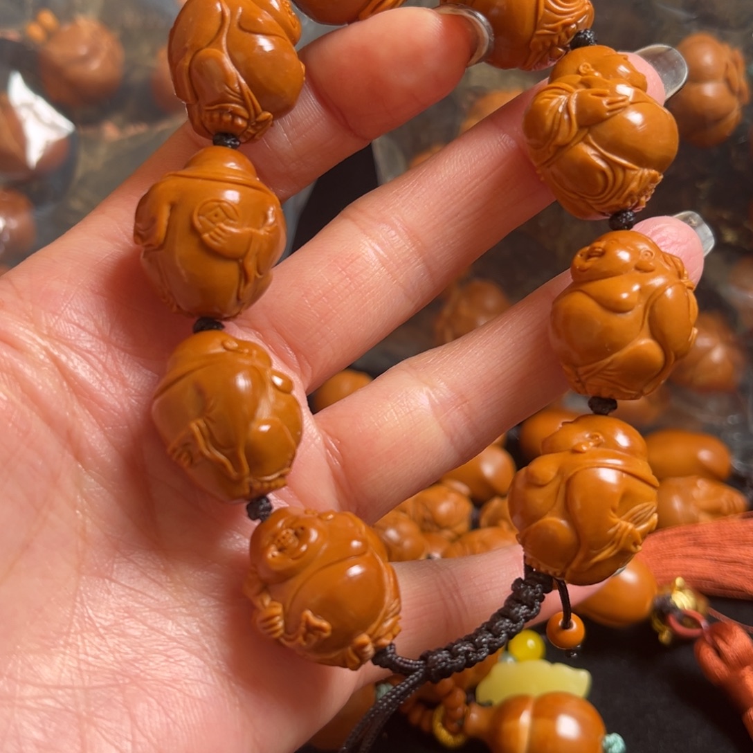 臭***康橄榄核吊坠米勒串