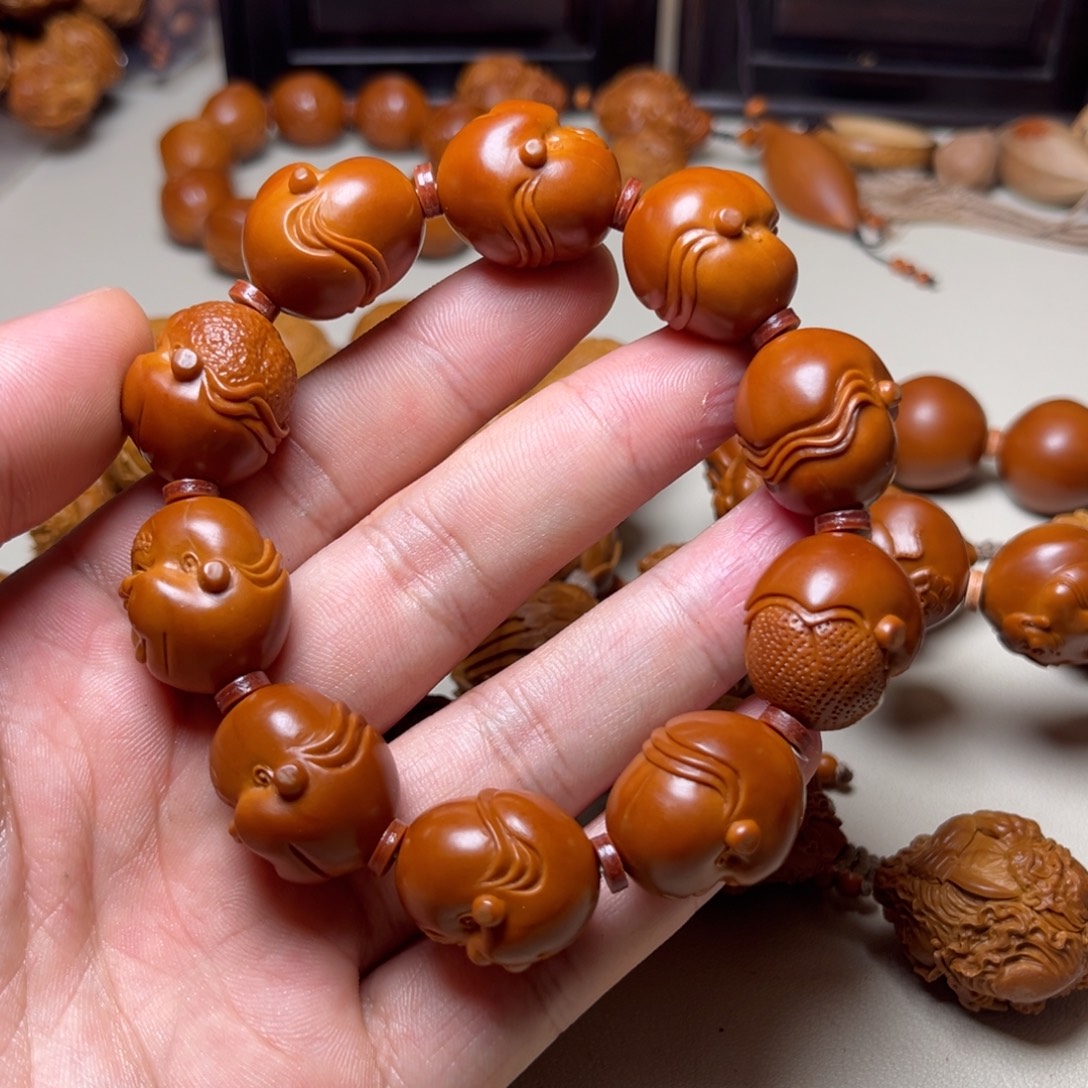 狮***人橄榄核手串橄榄核