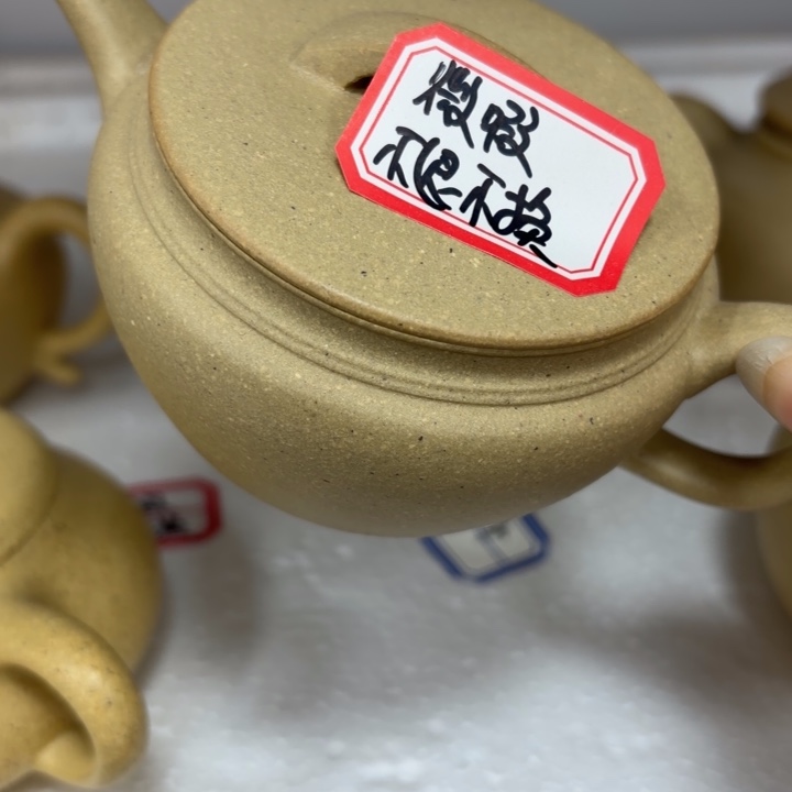 蕾***。紫砂茶壶宜兴原矿梨皮