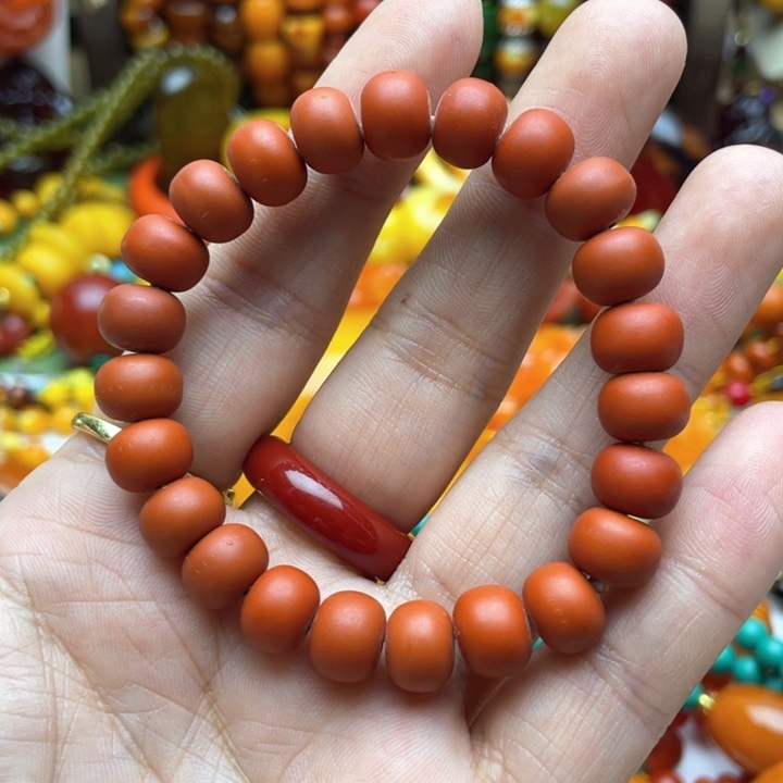 树脂制品44号橘色手串