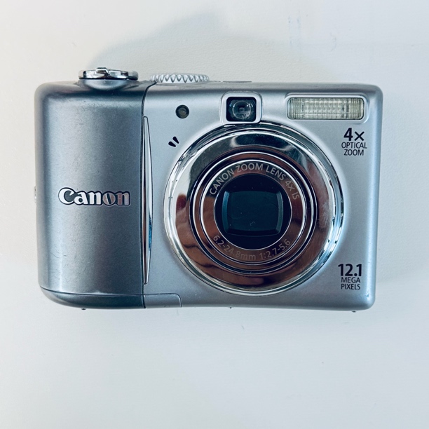 95新 Canon/佳能 a1100特价1210w像素出片奶油冷白五号电池自备