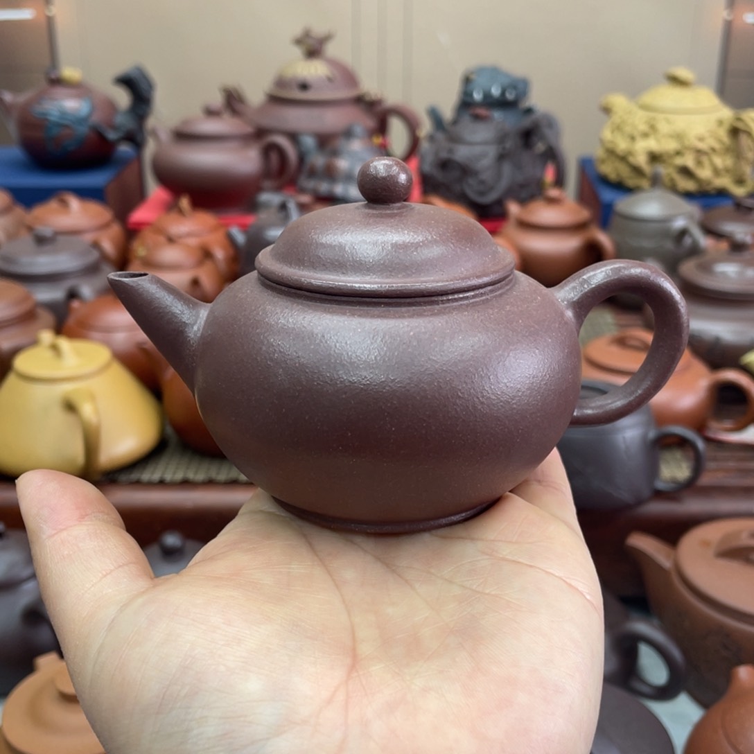 紫砂茶杯宜兴紫砂壶收藏起来