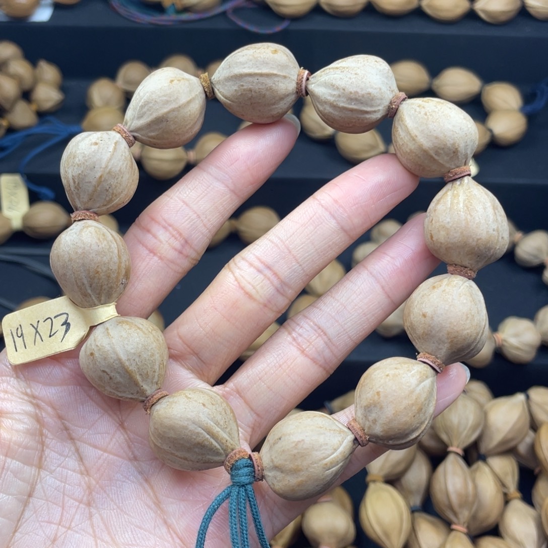 002橄榄核三花19*23