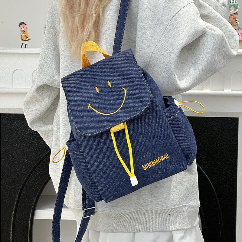 美少女studio【简约牛仔笑脸背包学院风双肩包轻便旅行包】