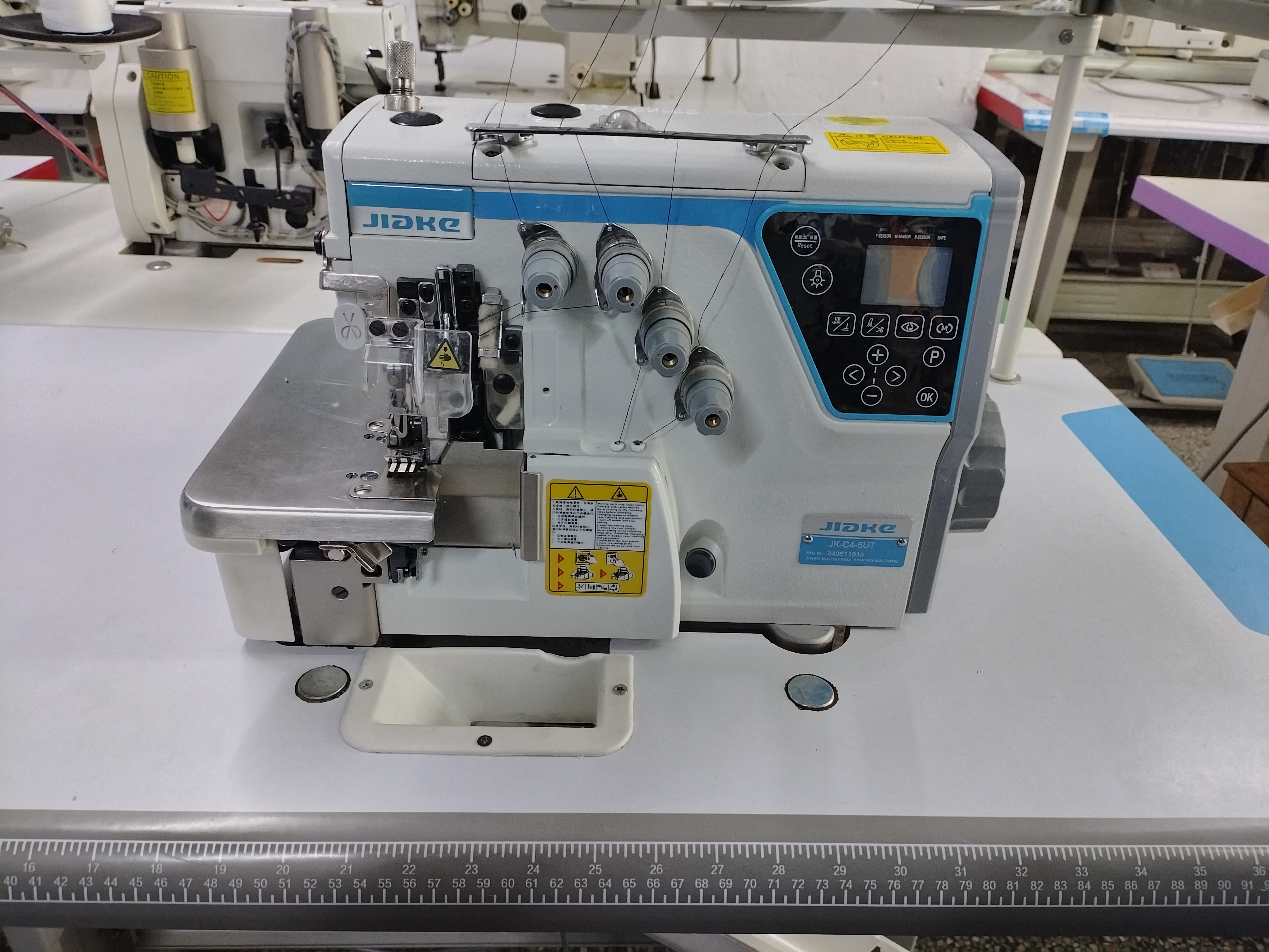 步进款电脑五线包缝机