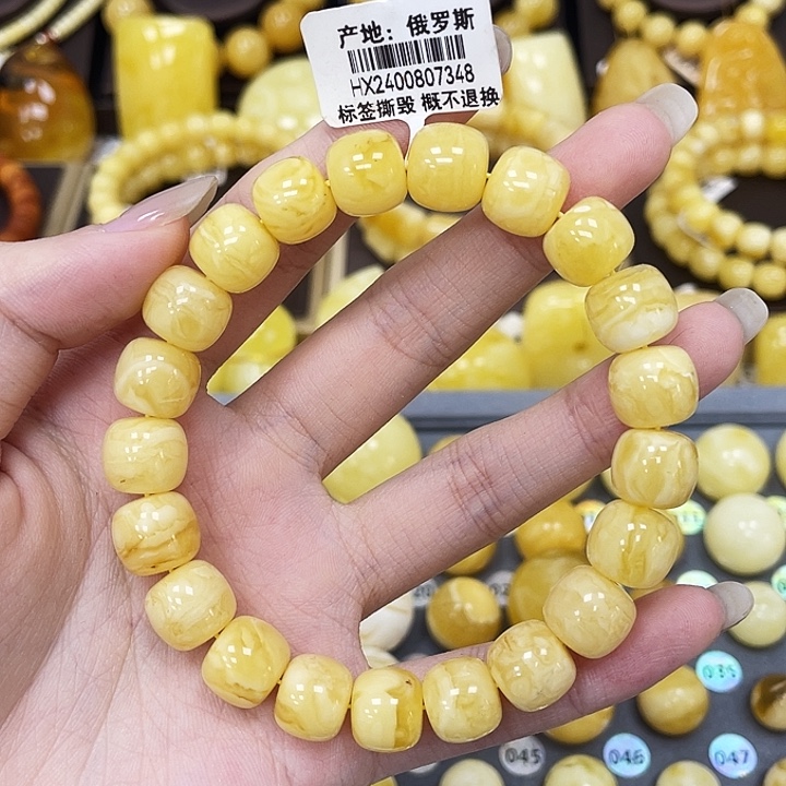 琥珀未镶嵌裸石10.9mm+老噶手串瑕 