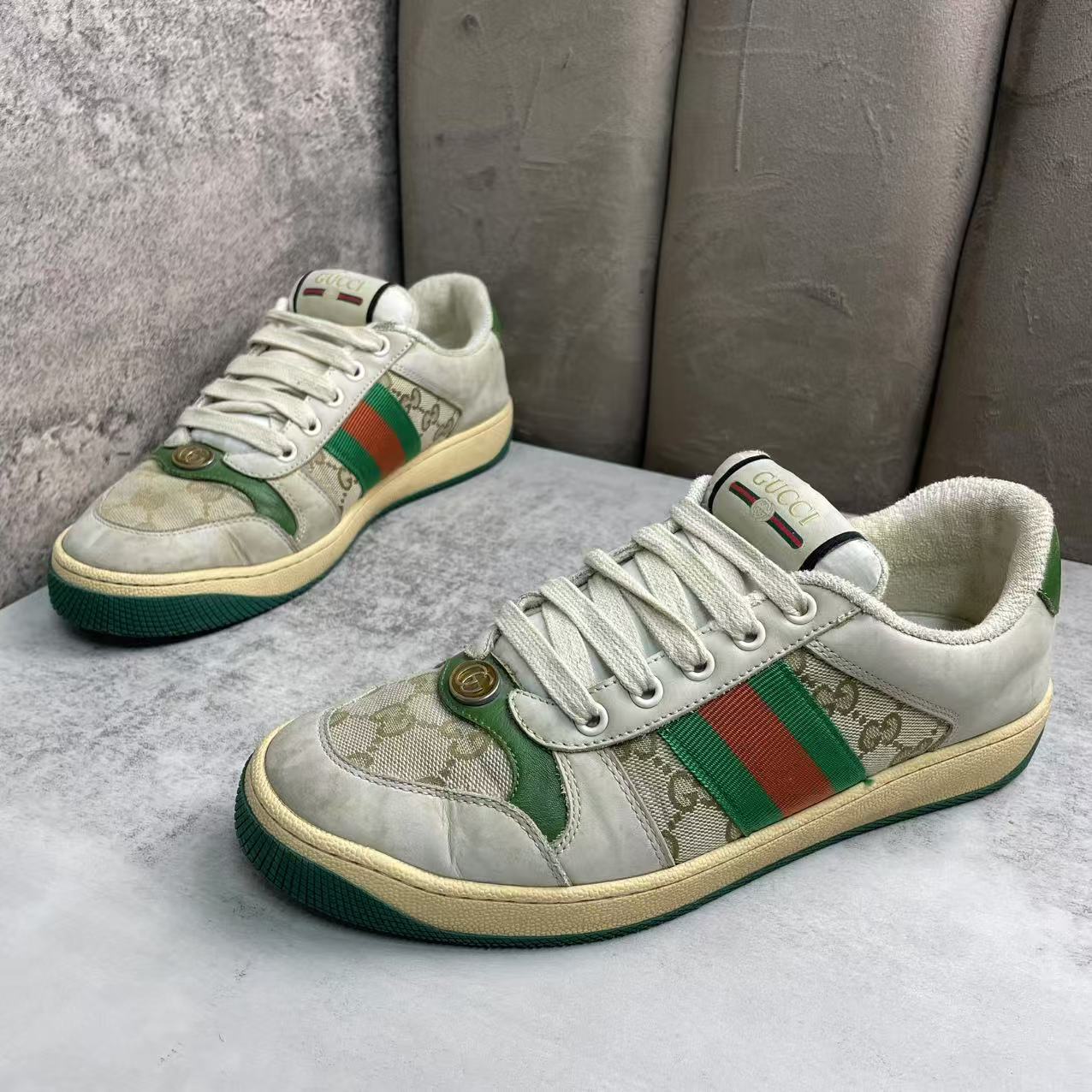 95新 GUCCI/古驰 乌木色皮革双G时尚百搭低帮做旧脏脏鞋/38码